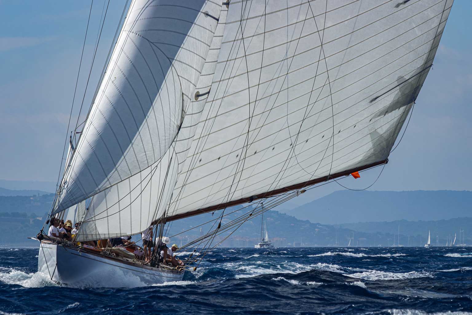 sailboat cruising across ocean