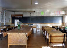  This picture gives us a look inside the schoolhouse.