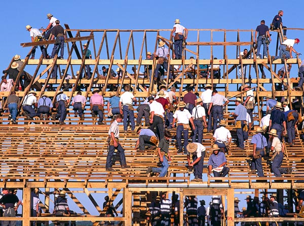 This a picture of a traditional Amish barn raising.