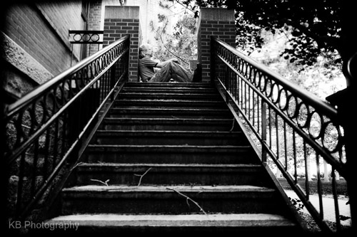 Person at top of steps illustrating leading lines